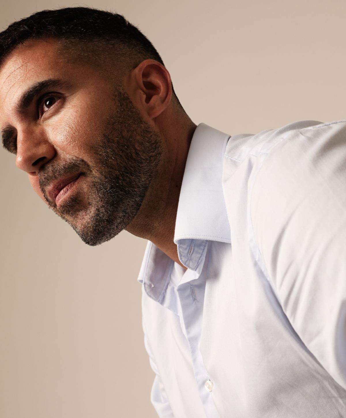 Savannah Hair Restoration Model wearing a blue shirt